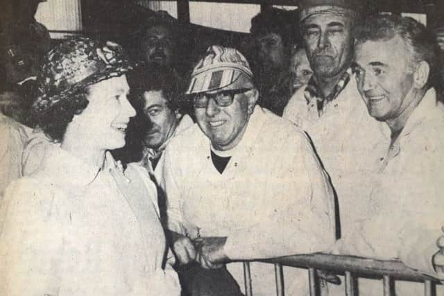 The Queen meets workers in the Fife town.