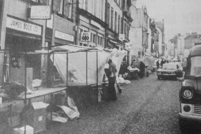 Over 100 market traders, led by Spook Erection - the company behind the market -  without permission. Nine people were arrested and fined