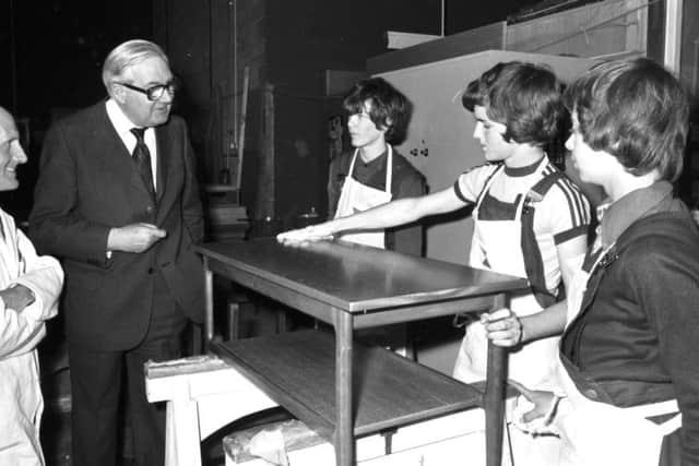 Prime Minister James Callaghan met to three trainees at the furniture factory