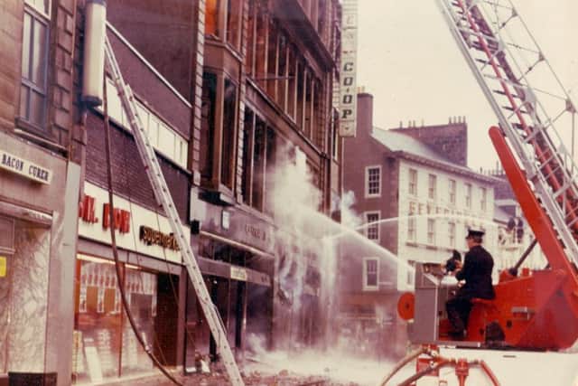 The £1m blaze destroyed the four-storey building on the High Street.