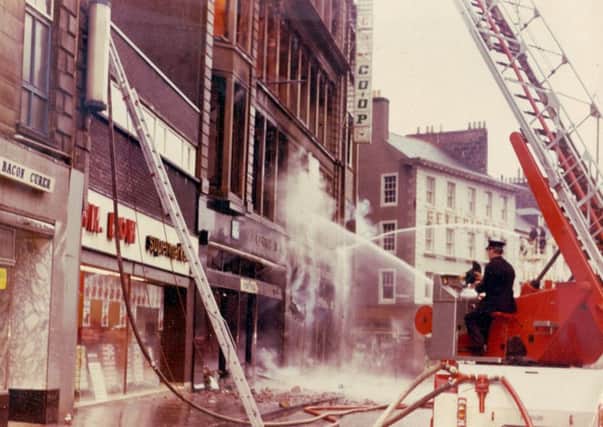 The £1m blaze destroyed the four-storey building on the High Street.