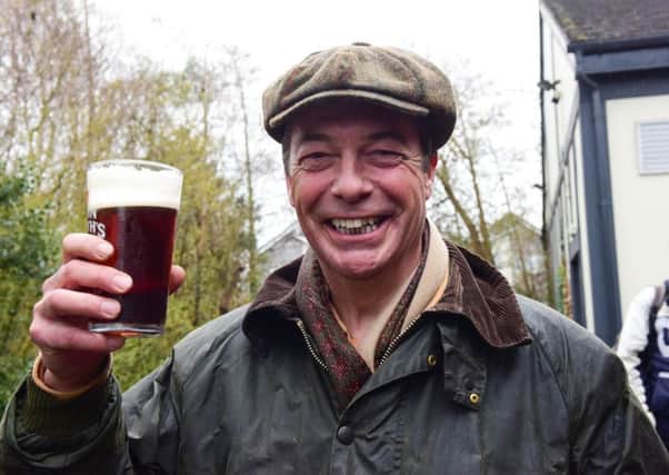 Nigel Farage enjoying a pint at the end of Saturday's 'March To Leave' at a pub in Hartlepool
