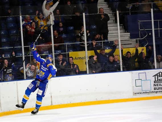 Celebrations on the ice and in the stands after Joe Basaraba struck the overtime winner. Pic: Steve Gunn