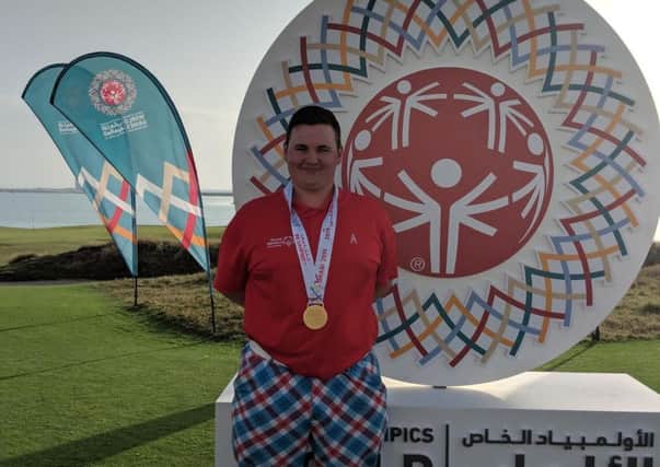 Andrew Stuart wins gold at the Special Olympics World Games.