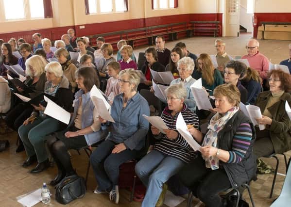volunteers gathered together to begin preparations for their performance at  East Neuk Festival. Picture by Peter Adamson.