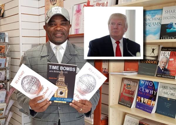 Pastor Joe with his new book, which has a chapter on Donald Trump who sent him a personal letter.
