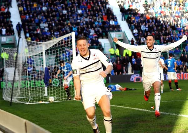 Raith Rovers striker John Baird scores the winning goal to defeat Rangers in Ramsdens Cup Final in 2014. (Pic: Tony Fimister)