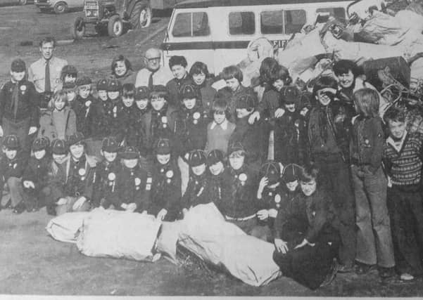 Members of the 9th Fife Scout Group stage a sponsored clear-up of litter in Kirkcaldy, collecting six tons of rubbish and taking it to the tip at Denburn Yard in 1977.