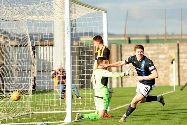 Raith Rovers striker Kevin Nisbet peels away to celebrate his last-gasp derby winner over East Fife. Pic: Fife Photo Agency