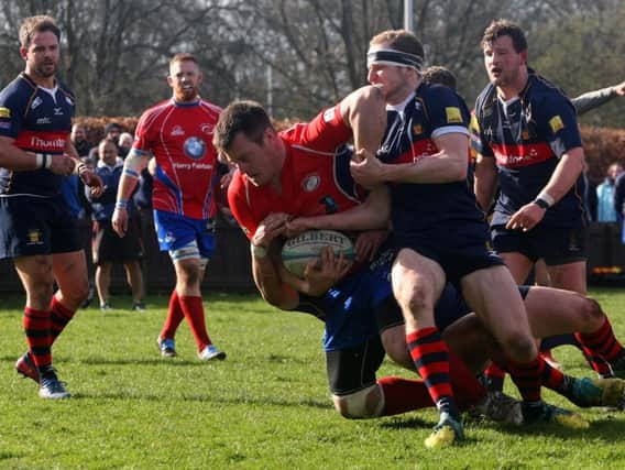 Craig Wilson is tackled to the ground during Kirkcaldy's sobering defeat to Dundee High on Saturday. Pic: Michael Booth