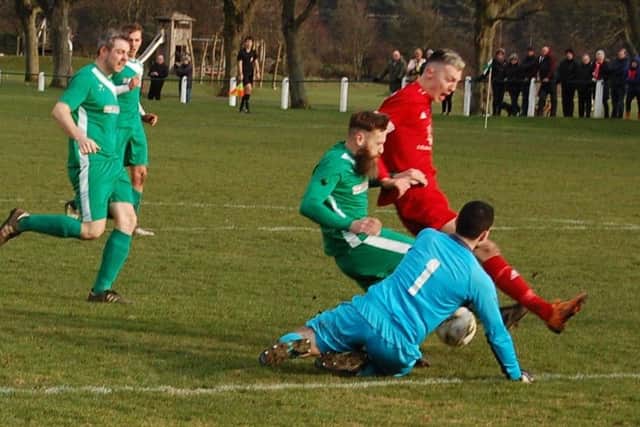 Lewis Payne, in red, wrapped up the win for Tayport. Stock image.