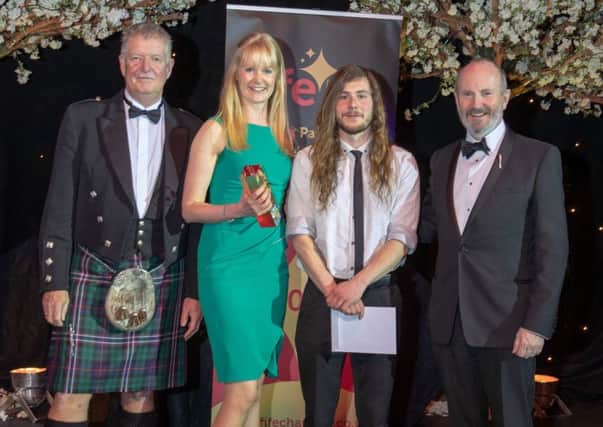 Best School Partnership, sponsored by BAE Systems, presented by Dave Rollo to Claire Reid, Education Manager and Calum Murray, Education Officer at The Ecology Centre. Pic: Kenny Smith.