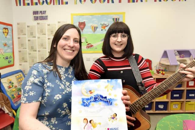 From left: Sarah Johnston, partnership development manager for Music in Hospitals & Care Scotland (MiHC), and musician Amy Rayner. Pic: Fife Photo Agency.