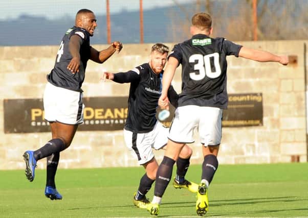 Iain Davidson (centre) after scoring his equaliser against East Fife - Fife Photo Agency