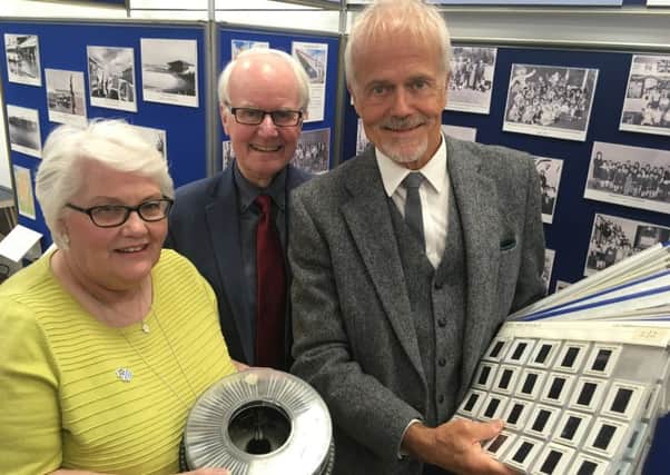 Linda Ballingall and David Brown from Glenrothes Heritage Centre with former town artist Malcolm Robertson.
