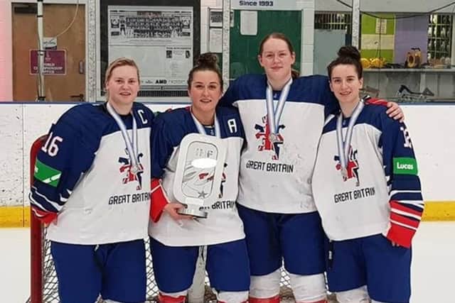 L to R Saffron Allen (C) Jodie Bloom (A) Kirkcaldy's Beth Scoon and Louise Adams with their medals and the trophy.