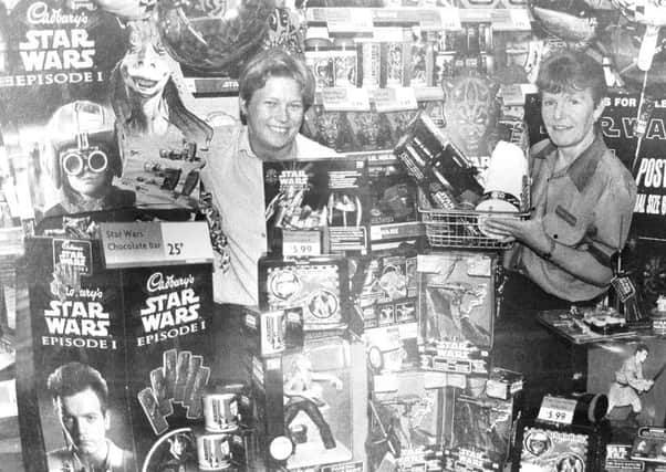Staff at the Phantom Menace display in Woolworths in 1999