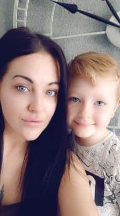 Stacey Thomson with her 8-year-old son Kynzli.