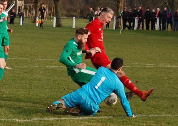 Lewis Payne (in red) played a key role for Tayport after his introduction. Stock image.