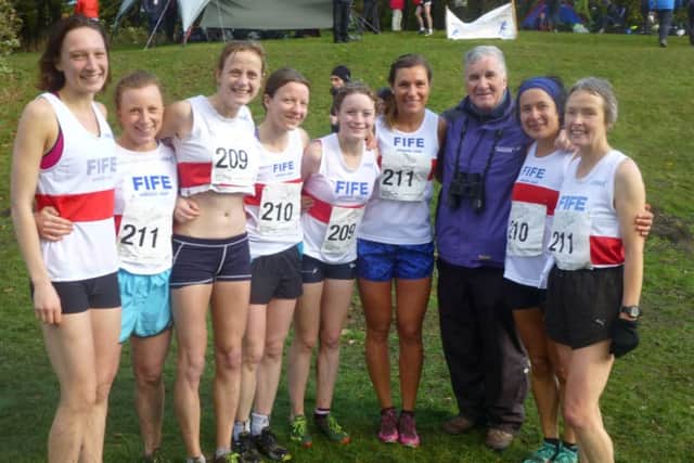 Coach Ron Morrison with some of his leading Fife female athletes.