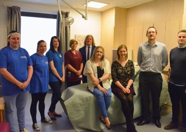 From left to right: Representatives from Fife Sands, midwifery manager Pamela Galloway, David Torrance MSP, and fundraisers Heather Slattery, Cathy and Mike Roberts, and James Slattery.