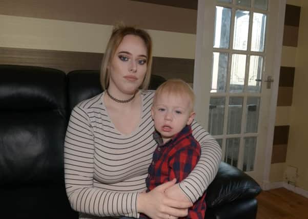 Fraud victim Chelsea Cowie with her son Jaxson.