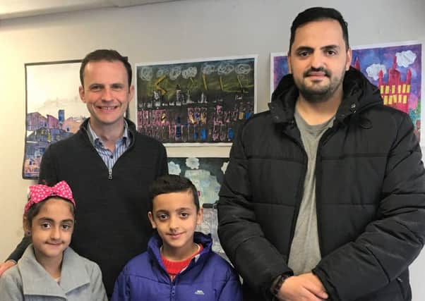 Stephen Gethins MP is pictured with Adam Alakil and his children Hashem and Tasnim.