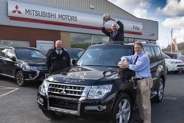 Fife Mitsubishi General sales manager, Stewart Smillie is on the ball for the Howe Annual 7s Tournament, along with Howe president, Chris Reekie and sales executive Steve Harper.