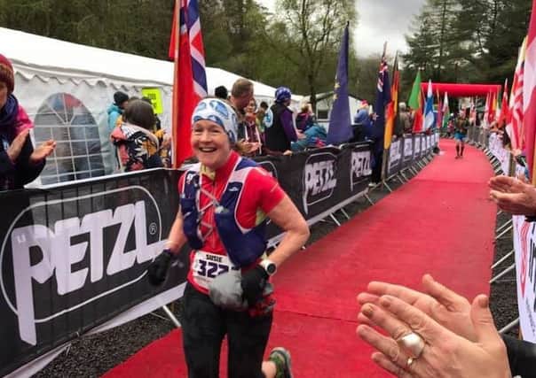 Susie Harley crosses the finish line at Tyndrum still looking fresh following her 53 mile Highland Fling Run