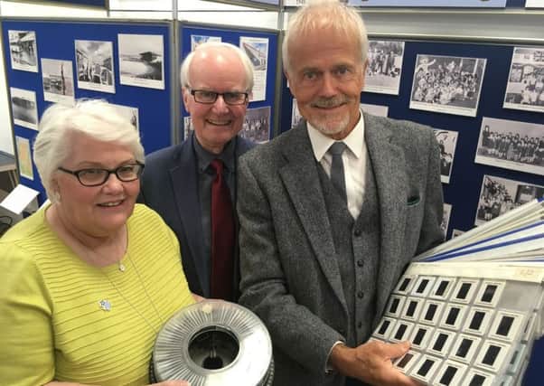 Linda Ballingall, & David Brown from Glenrothes Heritage Centre with former Glenrothes town artist Malcolm Robertson who has donated the the Centre a huge collection. (Pic FFP)