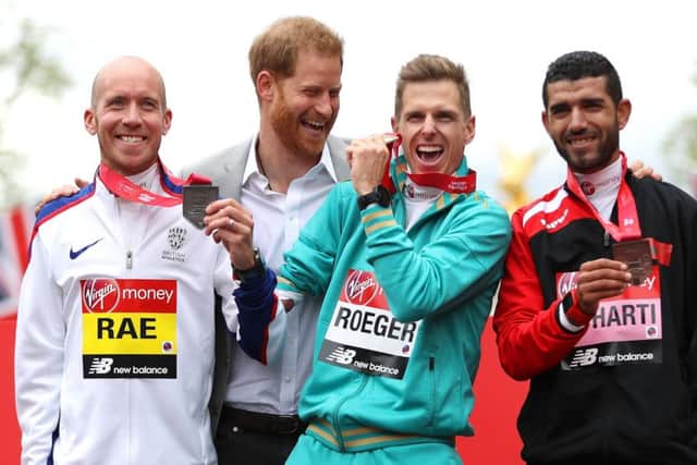 Derek Rae is congratulated by Prince Harry after winning silver (Photo by Naomi Baker/Getty Images)