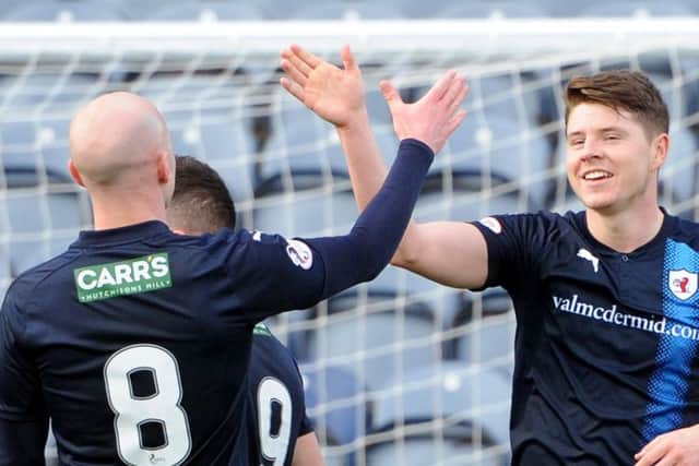 Stark's Park - Kirkcaldy - Fife -  Raith v Dumbarton  - KEVIN NISBET celebrates his 1st goal with Gillespie - credit- Fife Photo Agency