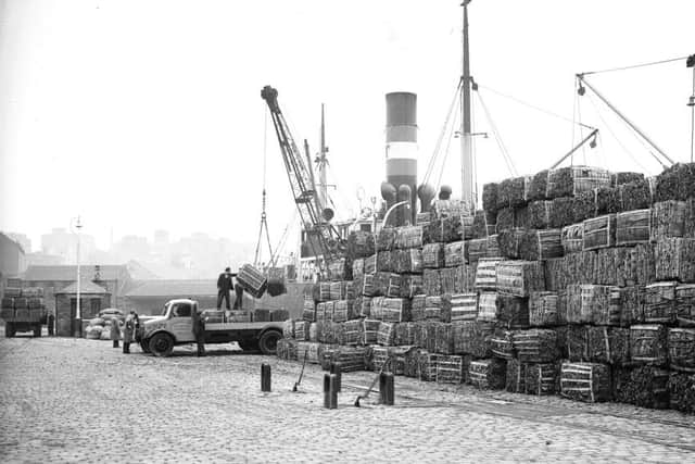 Unloading cork at the docks