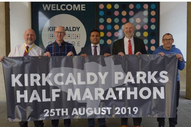 Kirkcaldy Half Marathon sponsorship deal. From left: Jim Buchan, Cllr Alastair Cameron, Tahir Ali, Cllr Neil Crooks, Jim Taylor (Pic: George McLuskie)