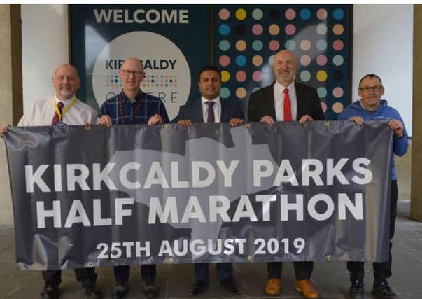 Kirkcaldy Half Marathon sponsorship deal. From left:  Jim Buchan, Cllr Alastair Cameron,  Tahir Ali, Cllr Neil Crooks, Jim Taylor (Pic: George McLuskie)