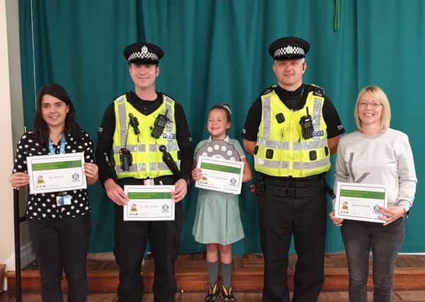 From left, Ms Brand, PC Parker, Bella Ballantyne, community police officer Euan Goudie, and Mrs Kotlewski.