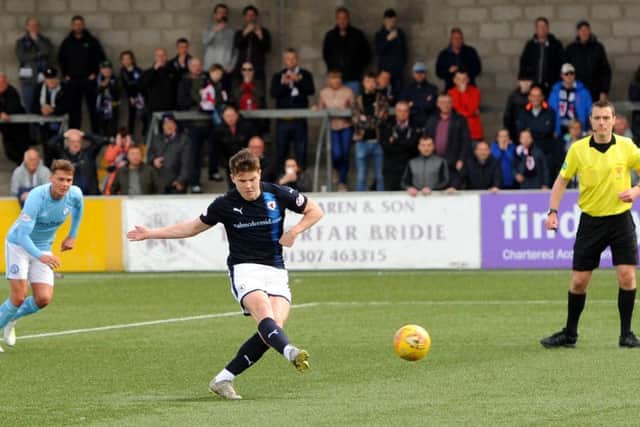 Kevin Nisbet slots home a penalty on his way to become the club's top scorer