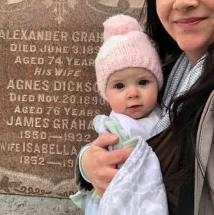 Kara with her daughter Clara at the grave site of her great-great-great grandfather who was born in Kirkcaldy in 1812.