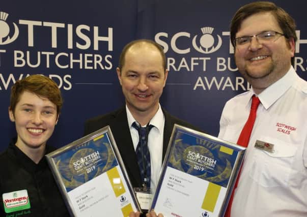 Amos Smith (centre) with contest sponsors (left) Erin Conroy from Verstegen and (right) Duncan McVicar from Scotweigh.