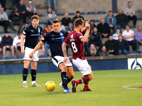 Ross Matthews makes a challenge during the 1st leg at Stark's Park. Pic: Fife Photo Agency