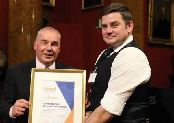 Fife Council's Bruce Lepley receives the award.