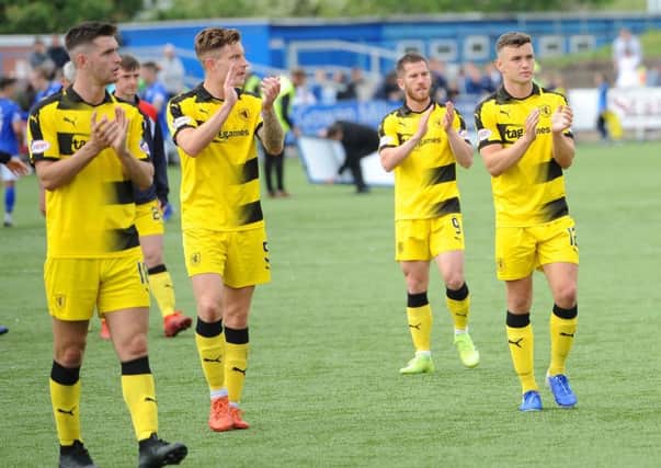 Raith players applaud the fans who had travelled to Dumfries (Pic: Fife Photo Agency)