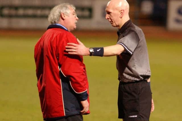 Referee John Rowbotham sends Livingston manager Jim Leishman to the stands.