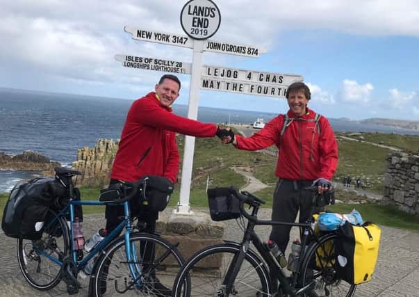 From left: Jamie Fraser and Neil Thain who completed a fundraising cycle to raise money for CHAS.