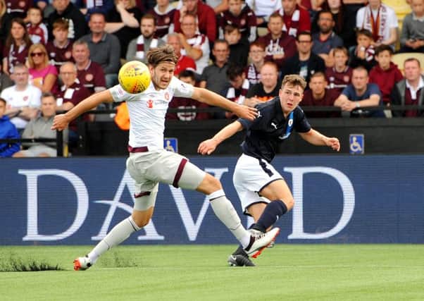 Euan Valentine in action against Hearts (Pic: FPA)