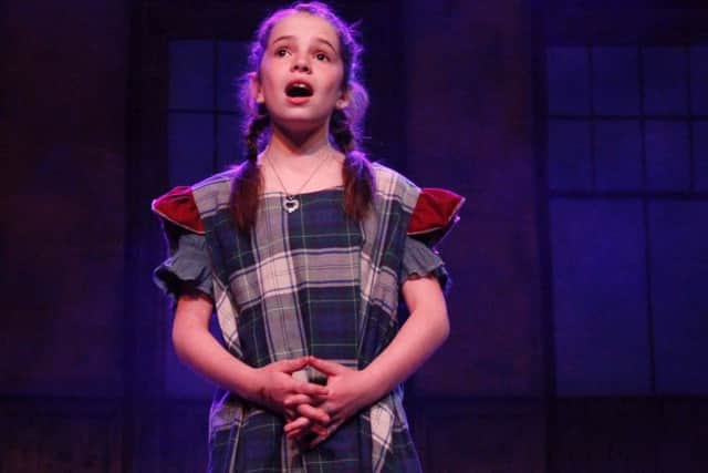 The role of Annie is played by Ruby McIlhatton in the latest production from YMTS. Pic: Hannah Wilson