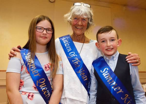 Queen Ella Forrest, and King Spencer Davies, with Citizen of the Year Willi Henderson