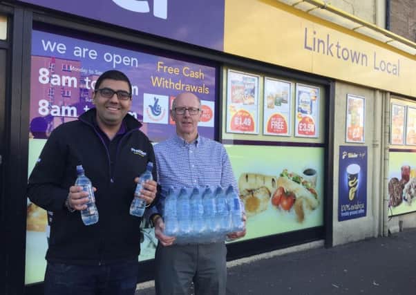 Kirkcaldy Half Marathon water sponsor - Faraz Iqbal with Councillor Alistair Cameron