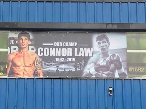 A tribute poster has been erected on the outside of the Glenrothes Boxing Club premises.