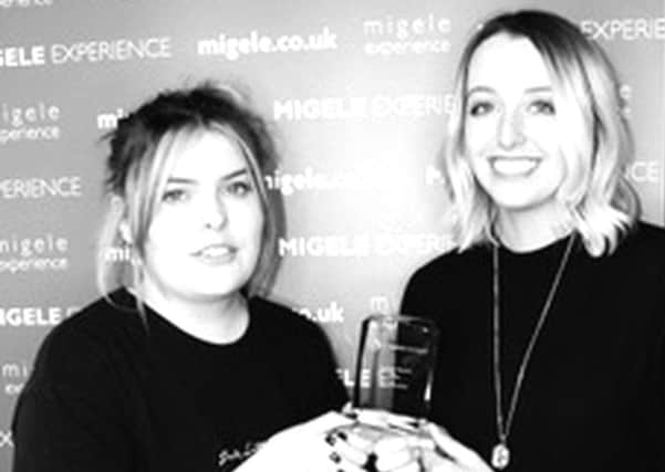 Pictured are Mairi Gibson (left) and Paula Law from Migele Experience with the award for Best Innovation.